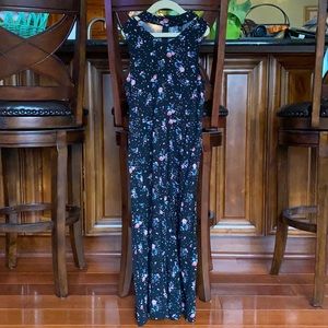 Flowy jumpsuit with neck detail.